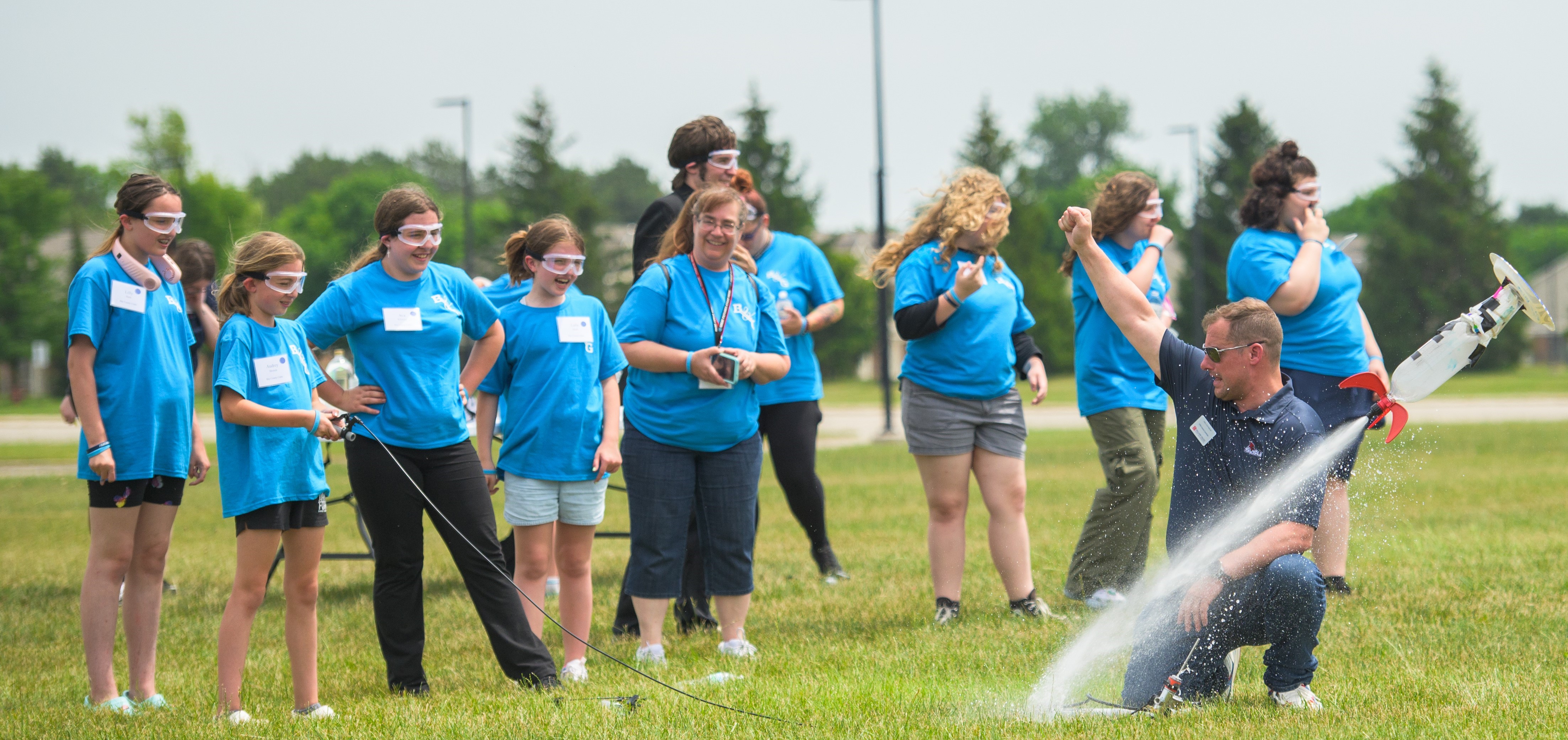 Student launching hydro rockets.
